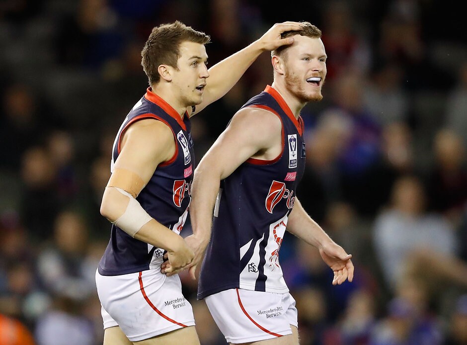 2016 VFL Grand Final - Footscray Bulldogs v Casey Scorpians MELBOURNE, AUSTRALIA - SEPTEMBER 25: Mitch White of the Scorpions (right) celebrates a goal with Jack Grimes of the Scorpions during the VFL Grand Final match between Footscray Bulldogs and Casey Scorpions at Etihad Stadium on September 25, 2016 in Melbourne, Australia. (Photo by Adam Trafford/AFL Media)